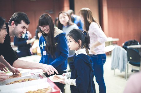 Giving out Pizza