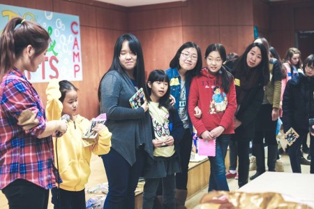 Kids lined up to share their picture frames